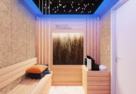 Graduation tower with branches surrounded by rock walls